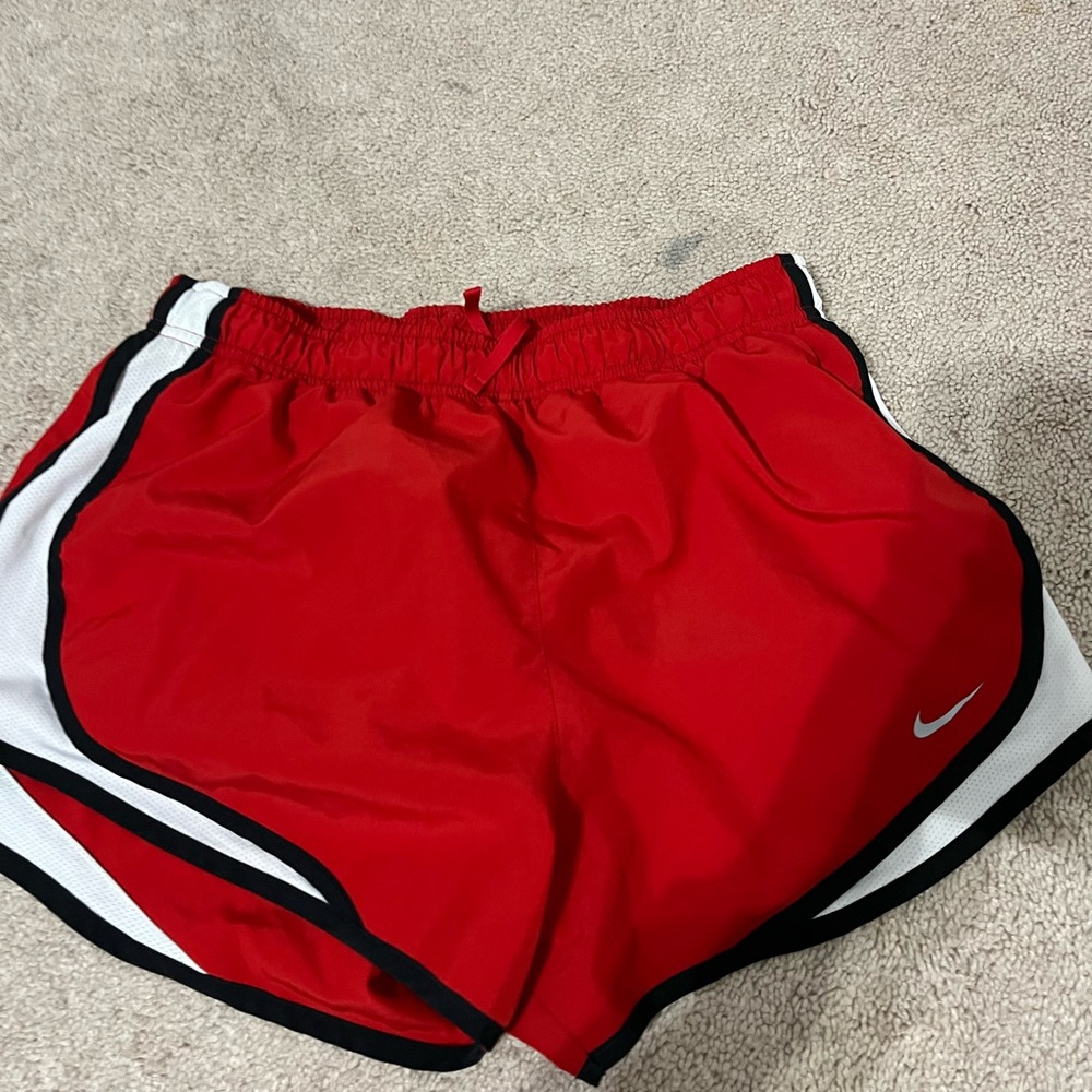 Red Nike shorts